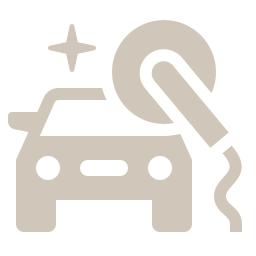 Icon of a car being polished with a buffer, with a sparkle indicating cleanliness or shine.